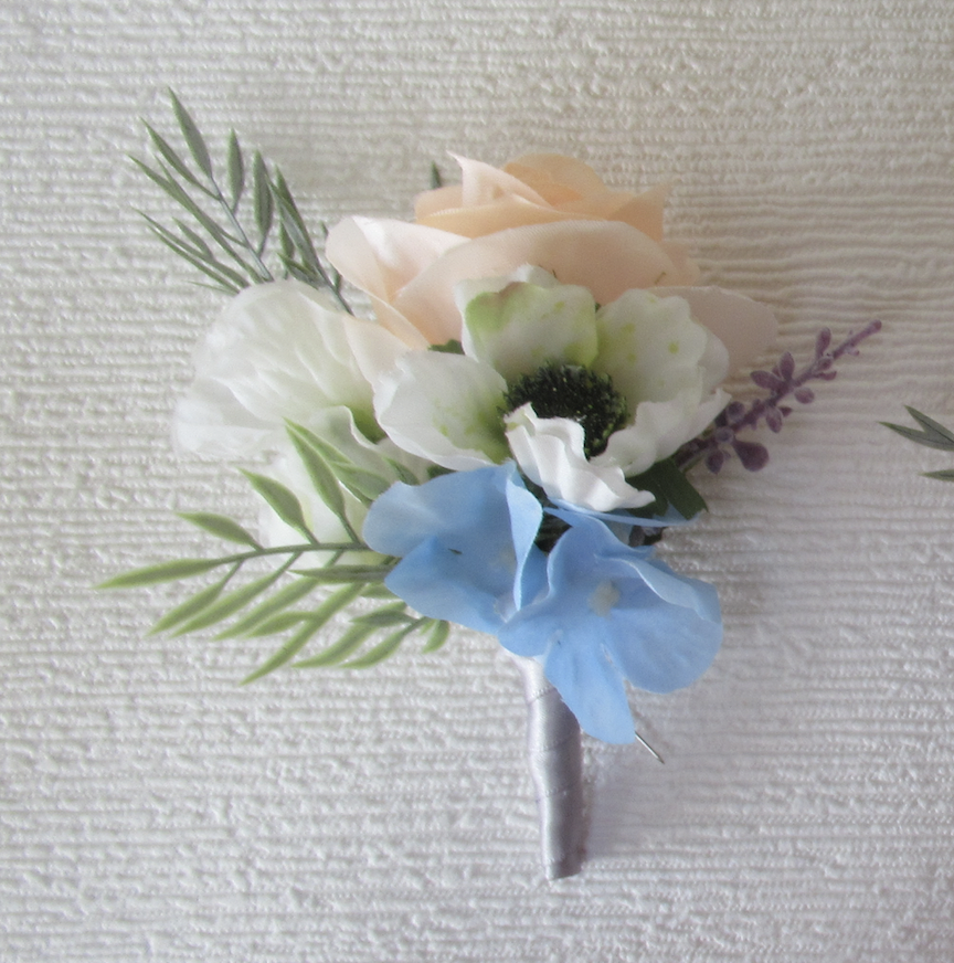 peach and sage green buttonhole